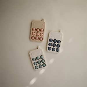 000631_2 Mushie Telefon Press Toy Blush